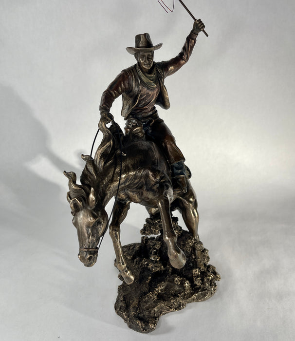 Bucking Bronco with Cowboy Statue