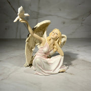 angel with doves statue 