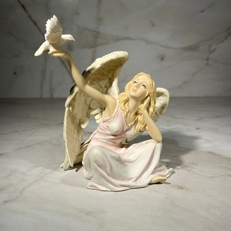 angel with doves statue 