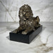 lion on plinth statue