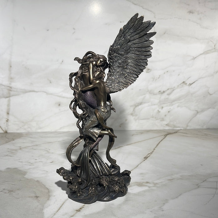 memaid and angel statue