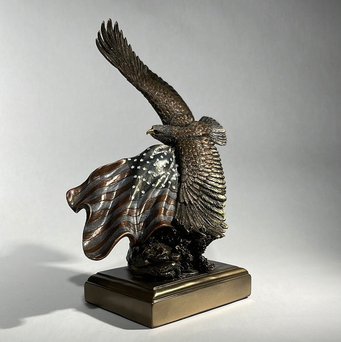 bronze eagle with American Flag Award