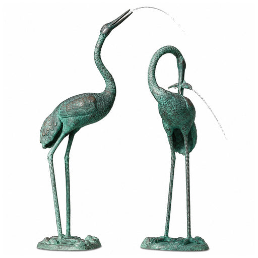 large cranes bronze fountain pair on white background