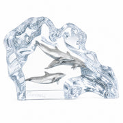 Lucite sculpture of dolphins and waves on a white background. Created by Kitty Cantrell. Made by Starlite Originals. Title: Dolphin Wave