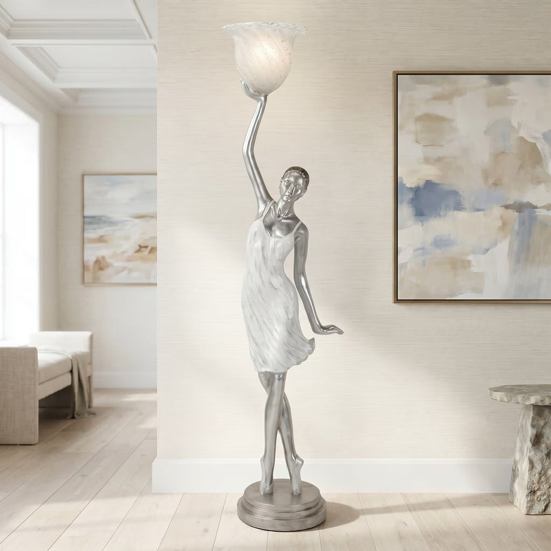life sculpture lamp of a modern dancer in a living room setting