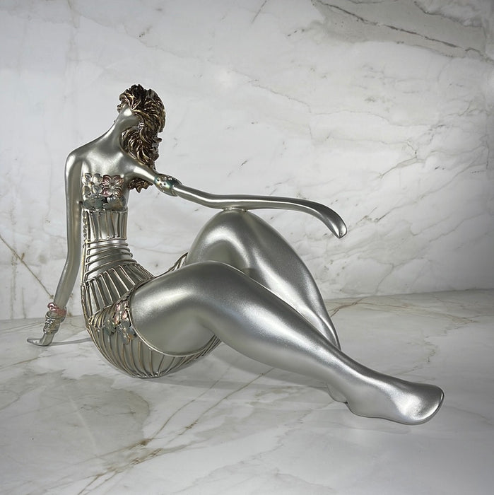 modern female silver sculpture 