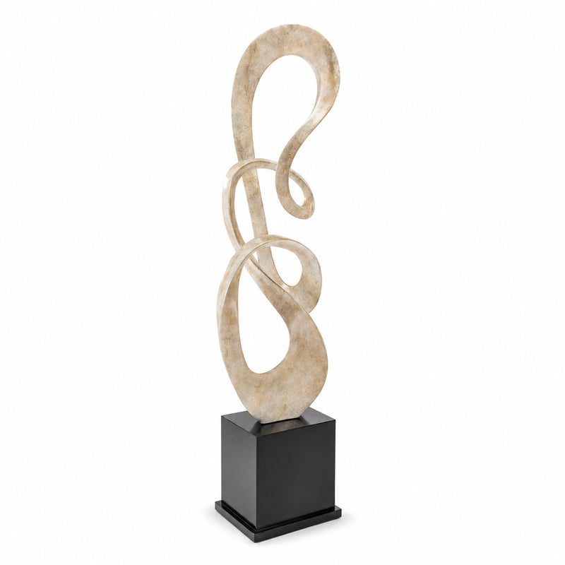 Abstract floor sculpture on white background. light colored beige finish