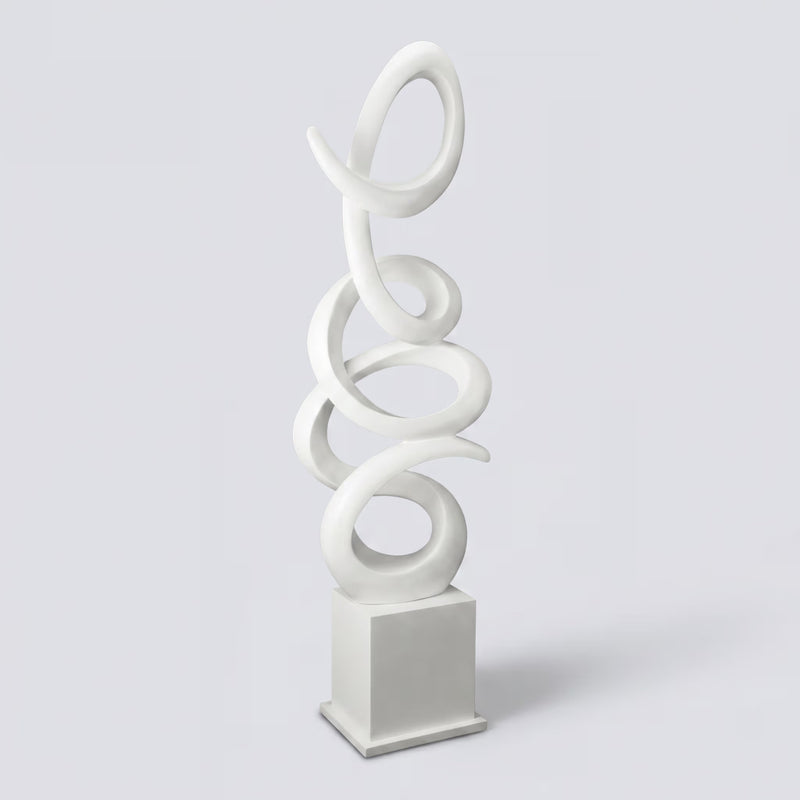 White abstract sculpture on a light gray background