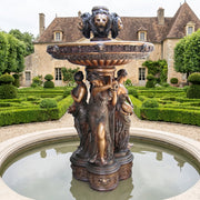 bronze four seasons fountain in formal setting. French country garden ideas