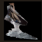 A sculpture of a mother whale and her calf crafted from polished Lucite with hand-painted hot wax patinas, appearing to be in motion.