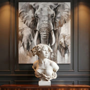 Bust of Negresse Captive on a wooden table with an elephant painting in the background