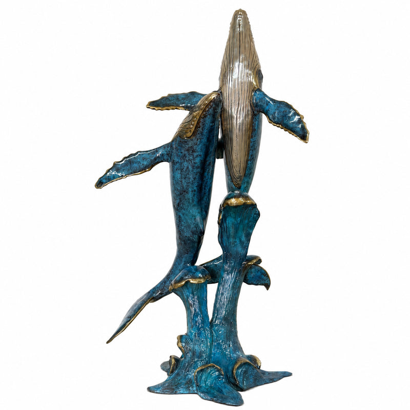 Humpback whales bronze outdoor fountain on white background