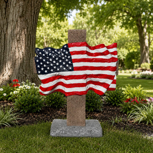 American flag with cross garden statue in park like setting