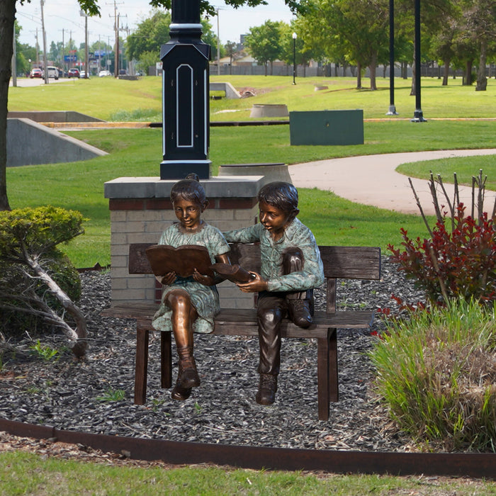 Girl & Boy Reading on Bench Bronze Sculpture