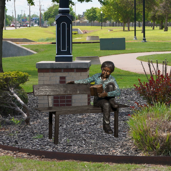 Young Boy Reading on Bench Bronze Sculpture