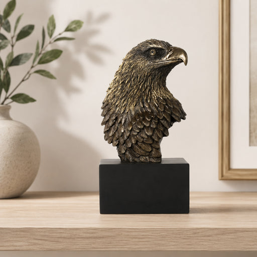 Eagle award bust statue in bronze finish on shelf