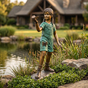 bronze statue of a girl holding a butterfly in her hand. garden statue.