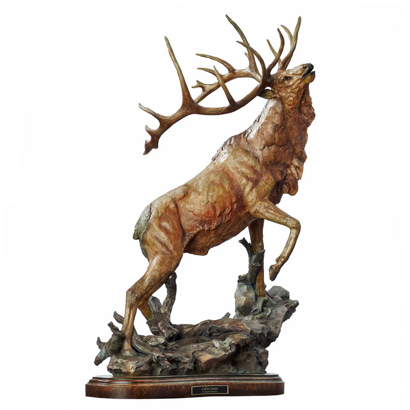 A detailed sculpture of an elk with a large rack of antlers, standing on a rocky base, painted with fine acrylics to give it a realistic appearance. Title: Call to Contest by Mill Creek Studios