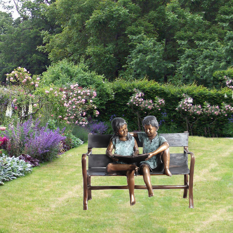 Boy & Girl Sitting on Bench Reading Bronze Sculpture
