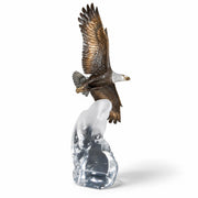bronze eagle sculpture on acrylic cloud base. White background