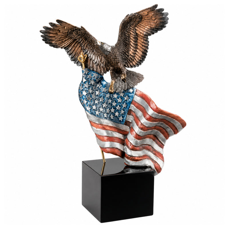Bronze statue of an eagle holding an American flag on a black granite base. Title of sculpture: Reaching Higher. Artist: Kitty Cantrell