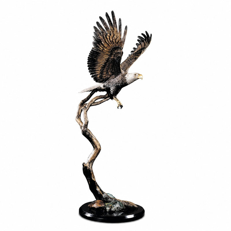 Statue of an eagle perched on a branch on a white background. large floor standing design