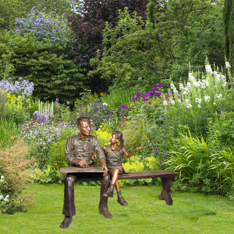 Grandpa and Granddaughter on Bench Sculpture