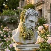 Bust of Hercules in garden with roses in background