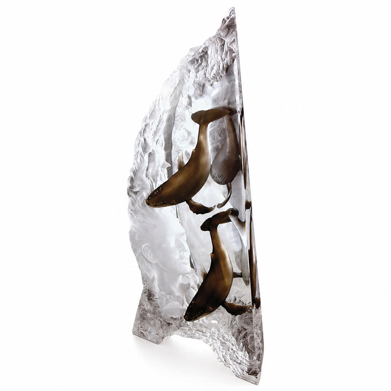 Decorative sculpture of two humpback whales with female face in Lucite. Sculpture name: Trinity. Artist: Dan Medina. White background
