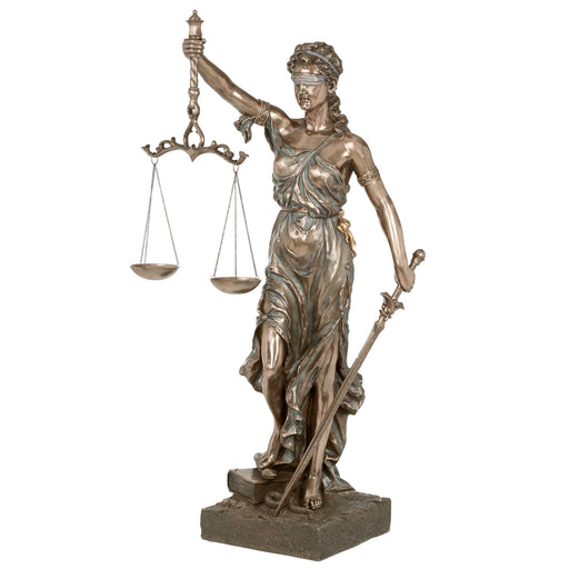 Statue of Lady Justice holding scales and a sword on a white background