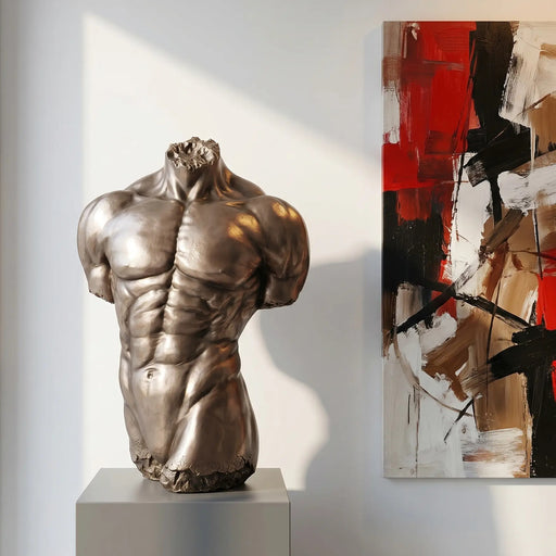 sculpture of a male torso on a pedestal. Modern abstract painting hanging beside. Modern interior design