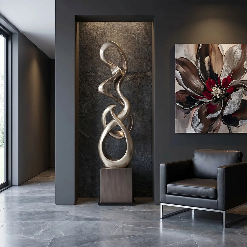 Modern interior with a large abstract sculpture and floral painting.