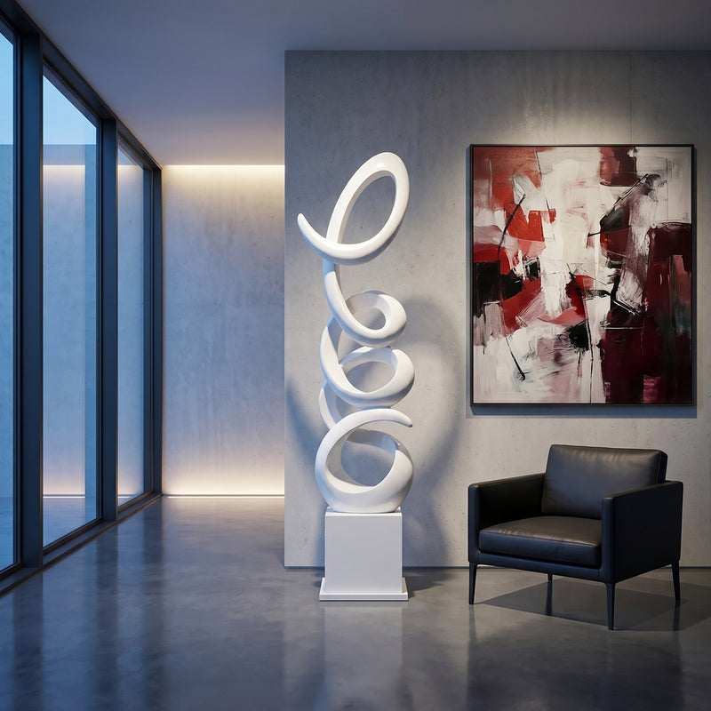 modern white floor standing sculpture in contemporary interior