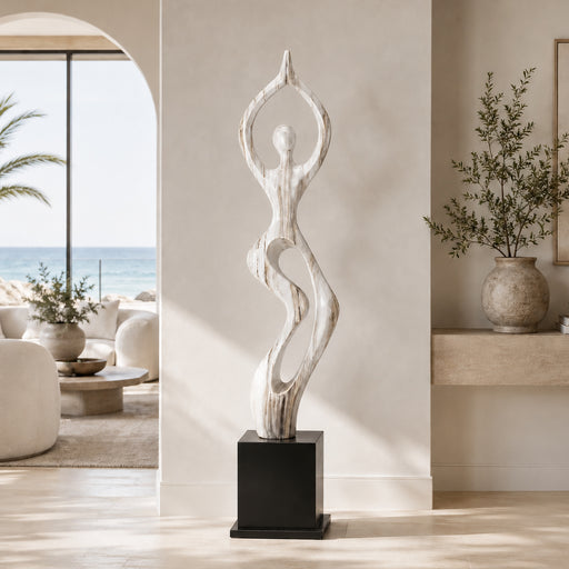 floor standing modern sculpture in white and cream on black base. California coastal interior design