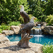 two bald eagles on rock bronze sculpture