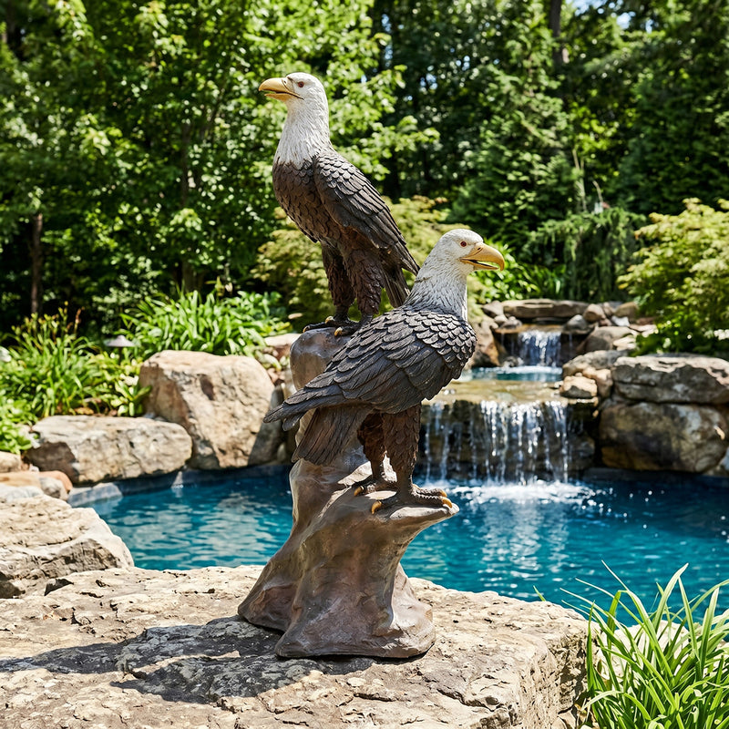 two bald eagles on rock bronze sculpture