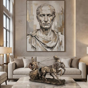Living room with a large portrait of Caesar  on the wall above a sofa and Roman chariot sculpture on coffee table.