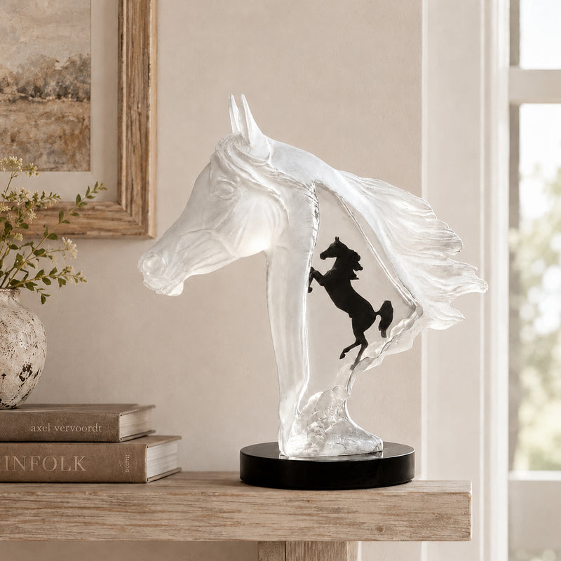 Decorative horse  bust "Royal Arabian by artist Kitty Cantrell". Bust on a wooden surface with books and a plant in the background.