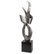 Abstract metal sculpture on a black base against a white background