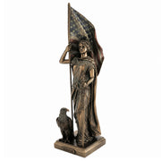 Cold cast bronze statue of Lady Liberty holding the American flag. Eagle sitting beside.