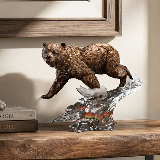 bronze and lucite bear sculpture in lodge setting
