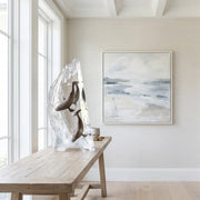Modern interior with abstract sculpture of a whale and painting on a wall