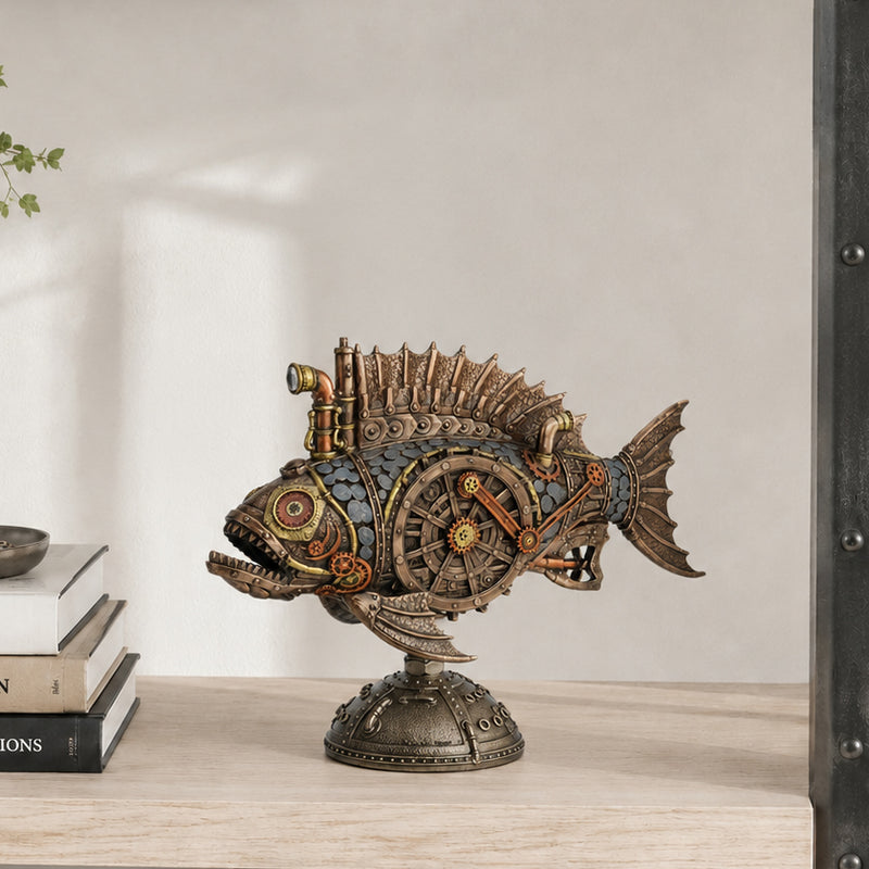 Steampunk fish sculpture on a decorative stand, styled on a light wood shelf next to stacked books against a neutral wall.