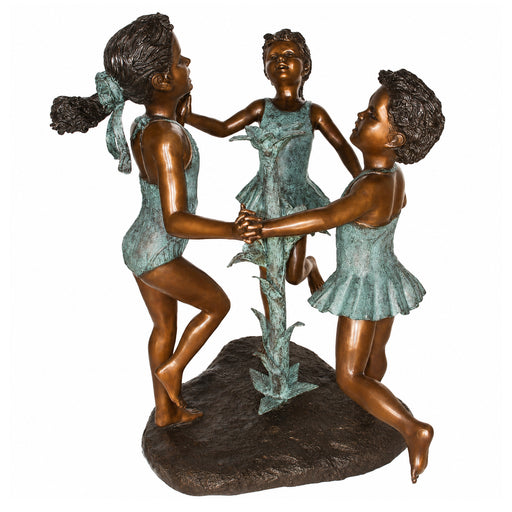 Bronze statue fountain of three dancers on a white background