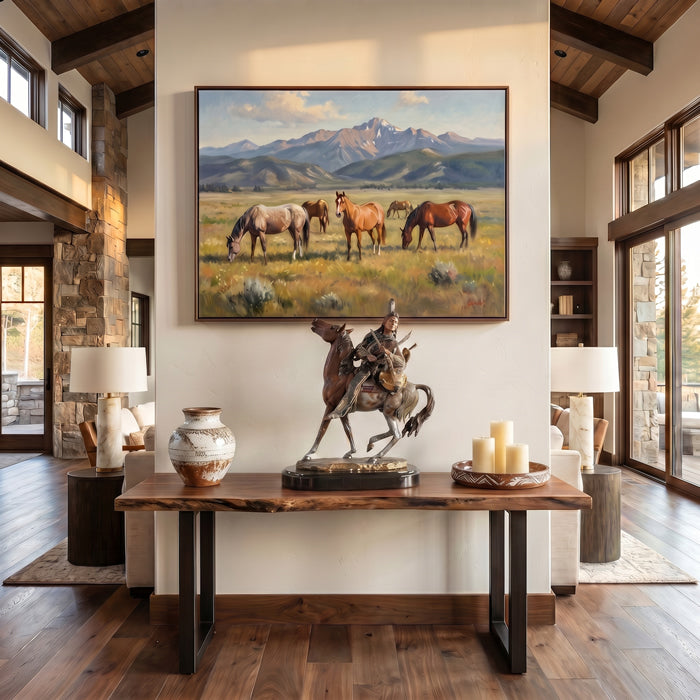 Living room with a large painting of horses in a field, a Native American Indian statue on a wooden table, and decorative items.
