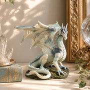 small dragon statue on table