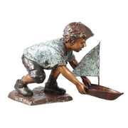 Bronze Boy with Sailboat Sculpture