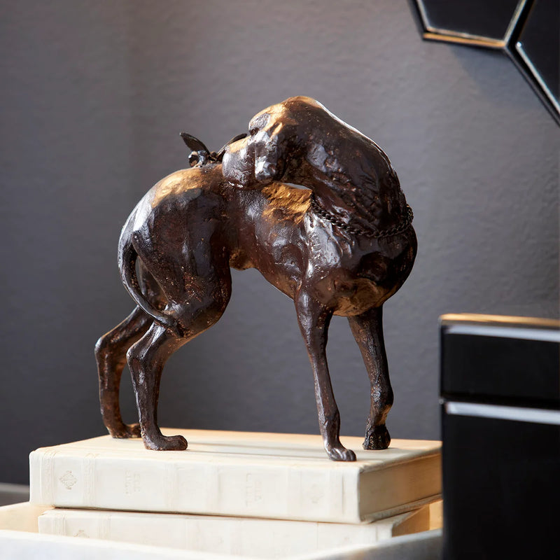 Dog and Butterfly Sculpture