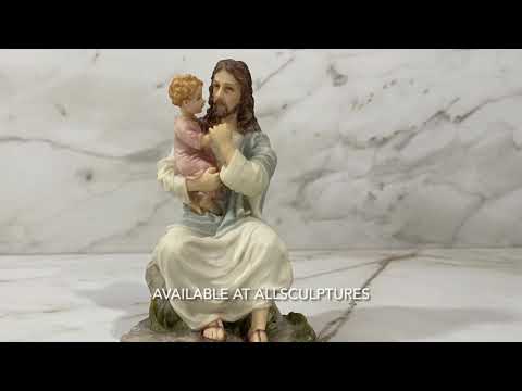 Jesus Holding A Child Statue Video