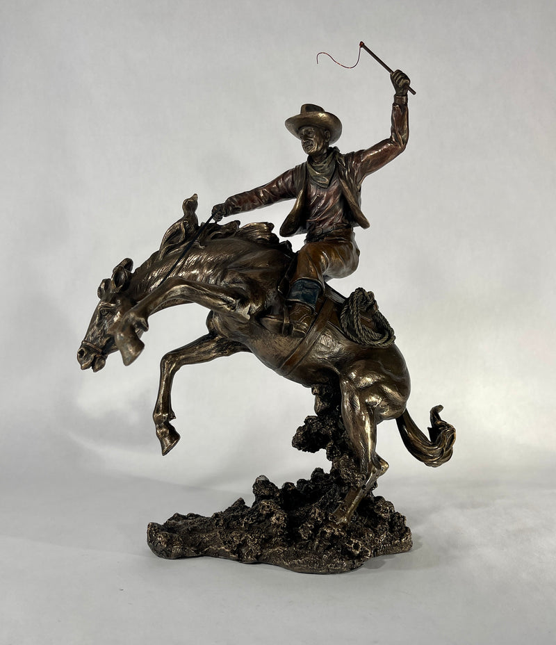 Bucking Bronco with Cowboy Statue